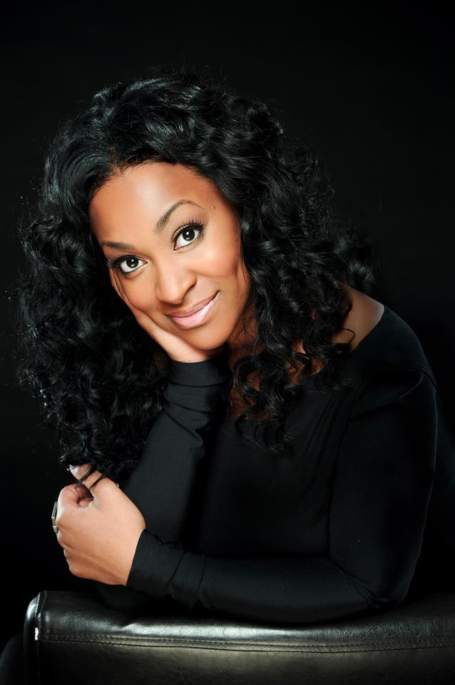 Jessica Reedy smiling in a black dress